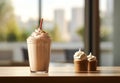 Fresh FrappuccinoÂ with cream served on the wooden table at cafe